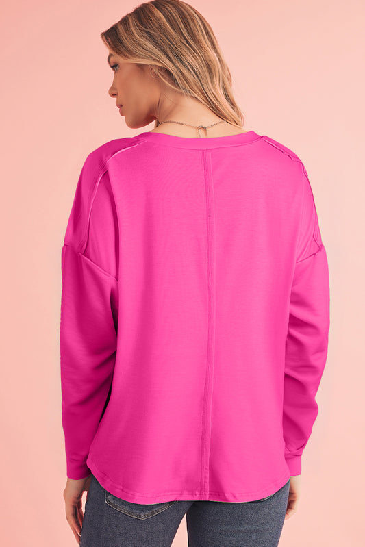 Top de cuello redondo con mangas caídas y bloques de color verde claro