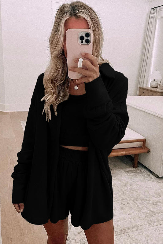 Conjunto de pijama de 3 piezas con camiseta sin mangas corta con dobladillo fruncido negro, pantalones cortos holgados y cárdigan