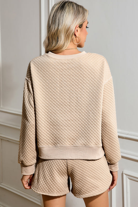 Conjunto de jersey y pantalones cortos lisos con acolchado de rombos de pergamino