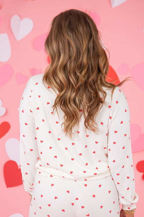 Ensemble pull à manches longues et pantalon imprimé cœur rouge flamboyant