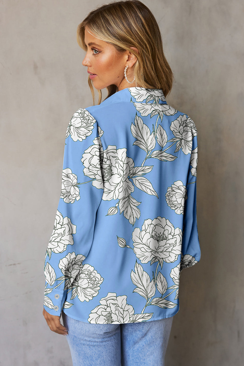Chemise plissée à manches bouffantes et imprimé floral bleu ciel