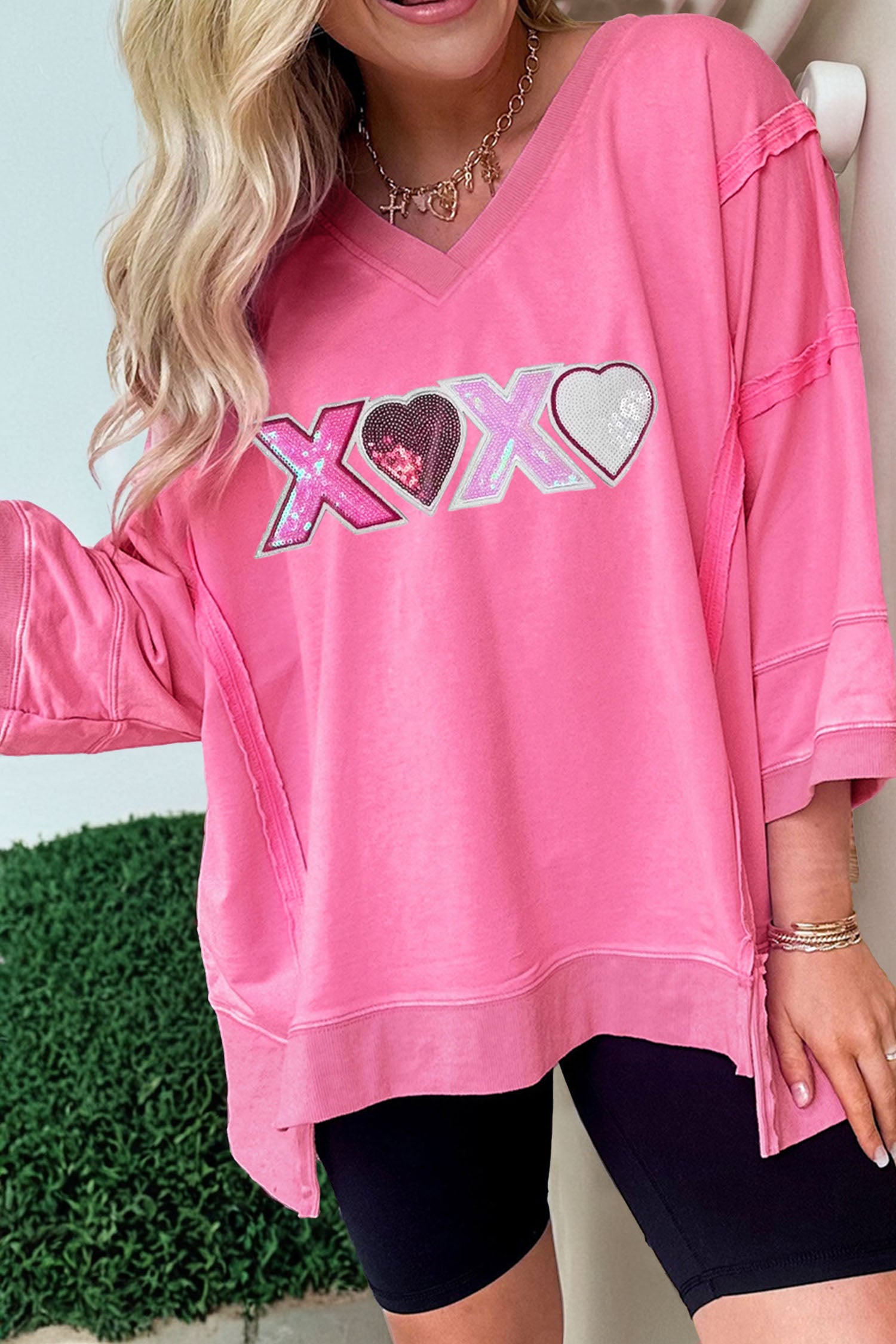 Bonbon Raw Seam Detail XOXO Sequin Patched Graphic V Neck 3/4 Sleeve Top