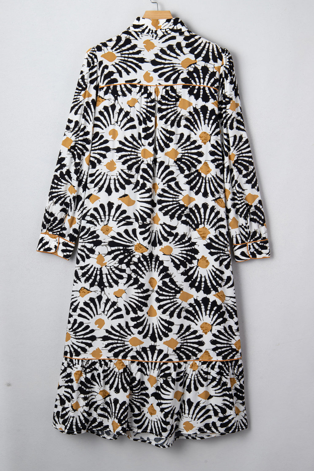 Robe longue noire à imprimé floral abstrait, fendue en V et à manches