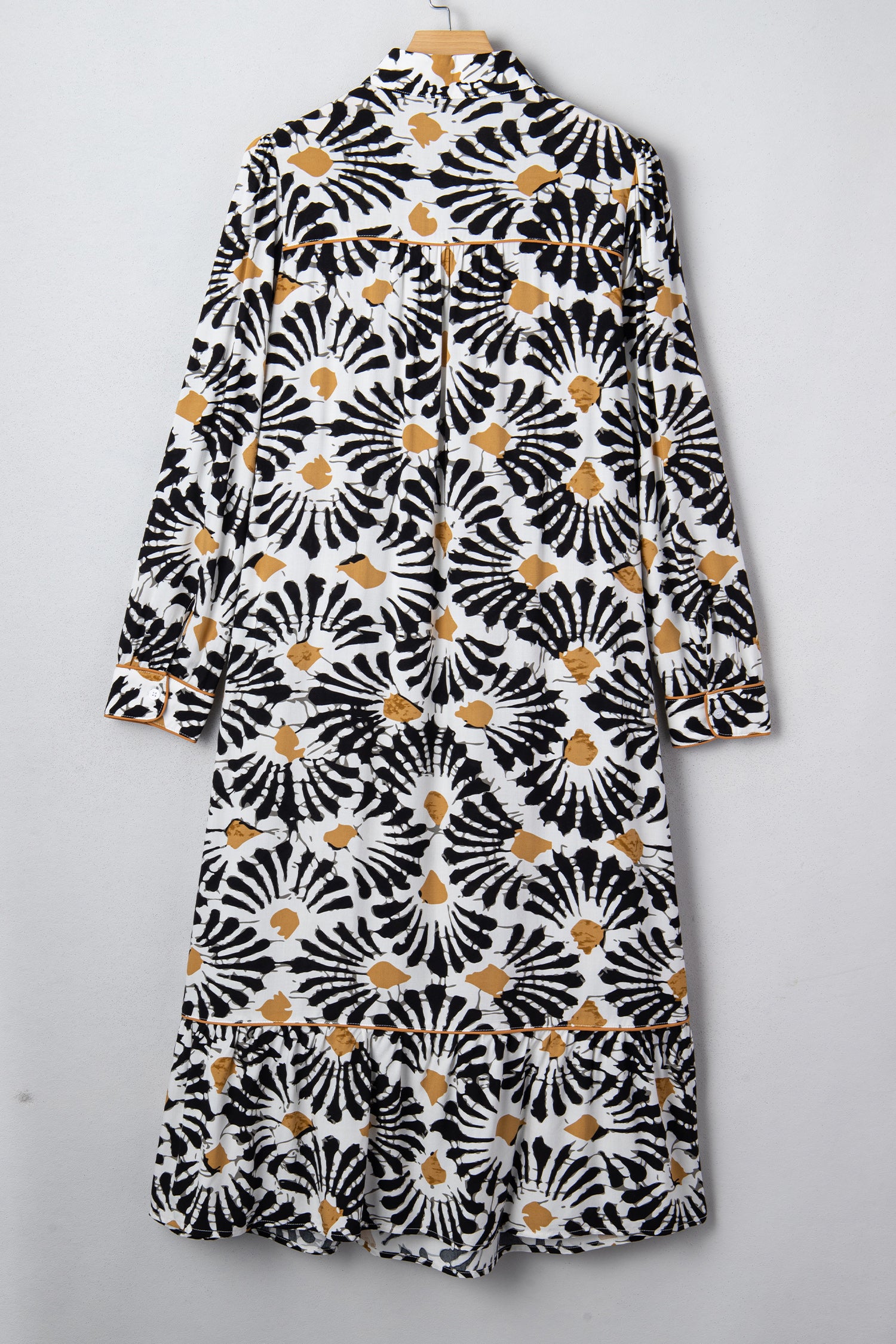 Robe longue noire à imprimé floral abstrait, fendue en V et à manches