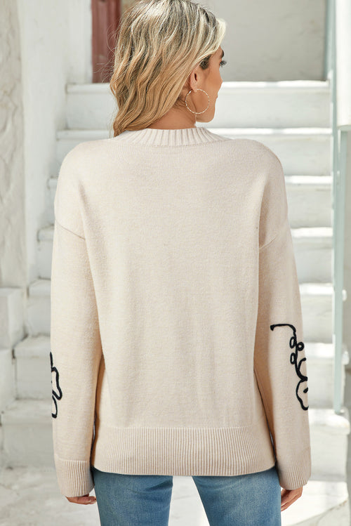 Pull en maille beige à col montant fleuri années 60