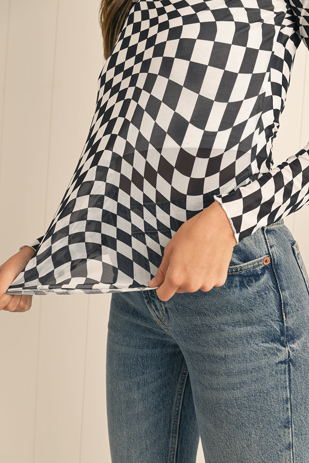 Haut à manches longues en maille à carreaux noirs