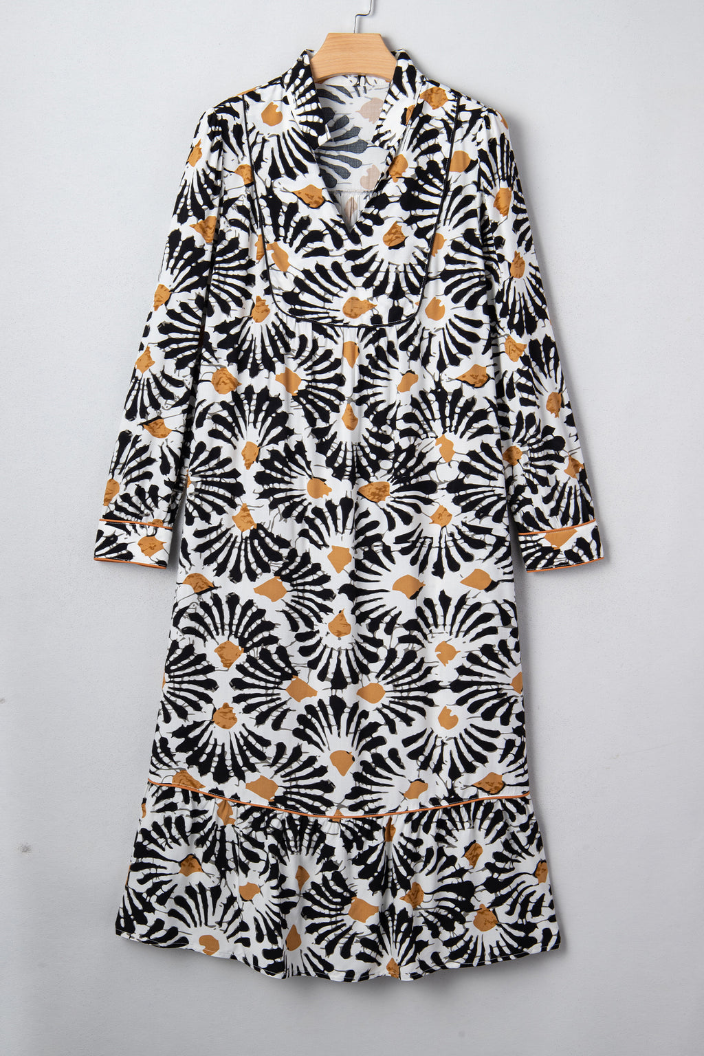 Robe longue noire à imprimé floral abstrait, fendue en V et à manches