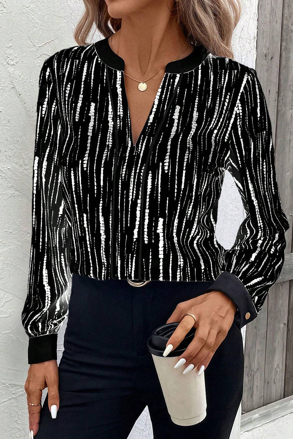 Blusa negra de manga larga con cuello en V y estampado abstracto de primavera y otoño