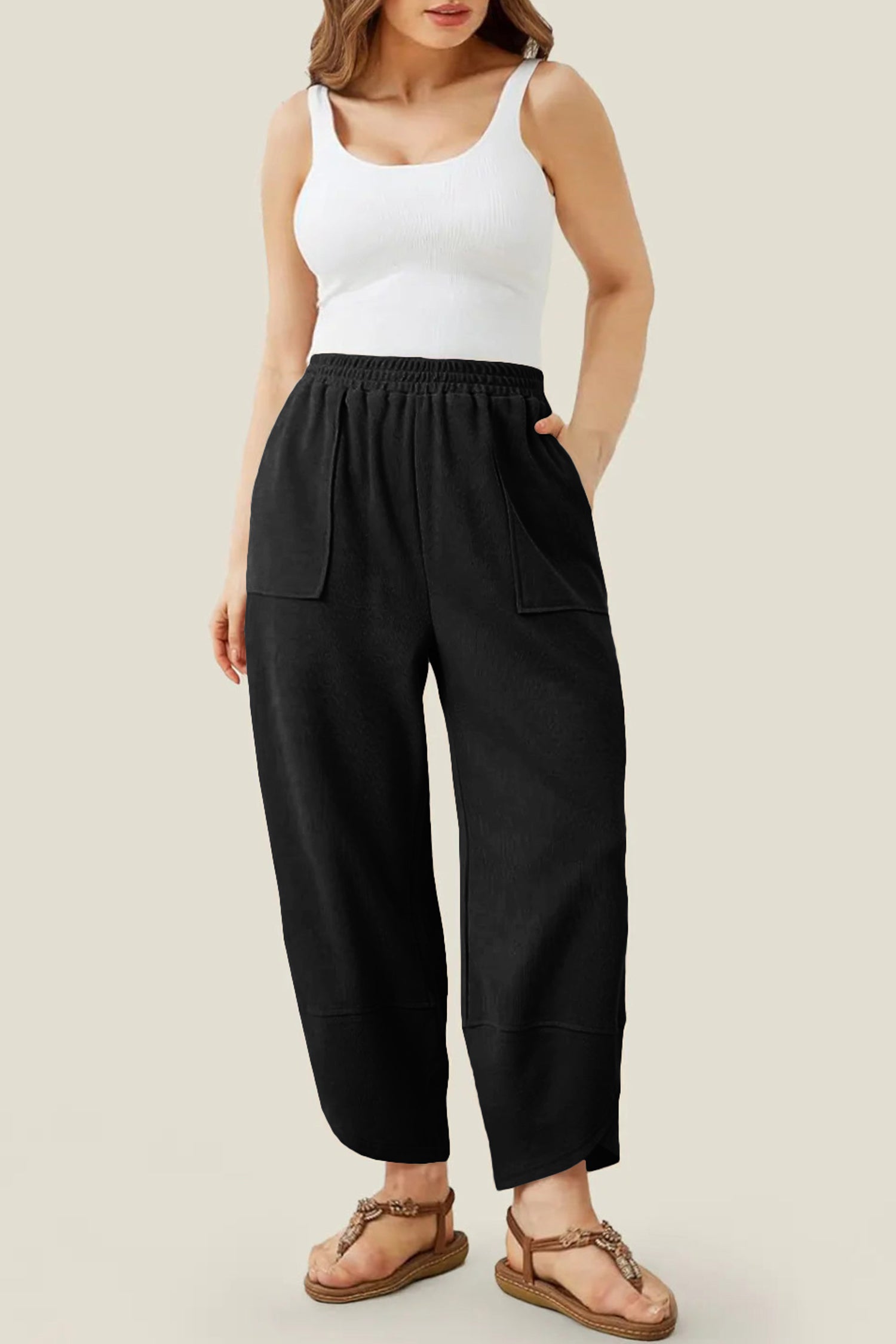 Pantalon capri noir grande taille à taille élastique et ourlet asymétrique, coupe ample