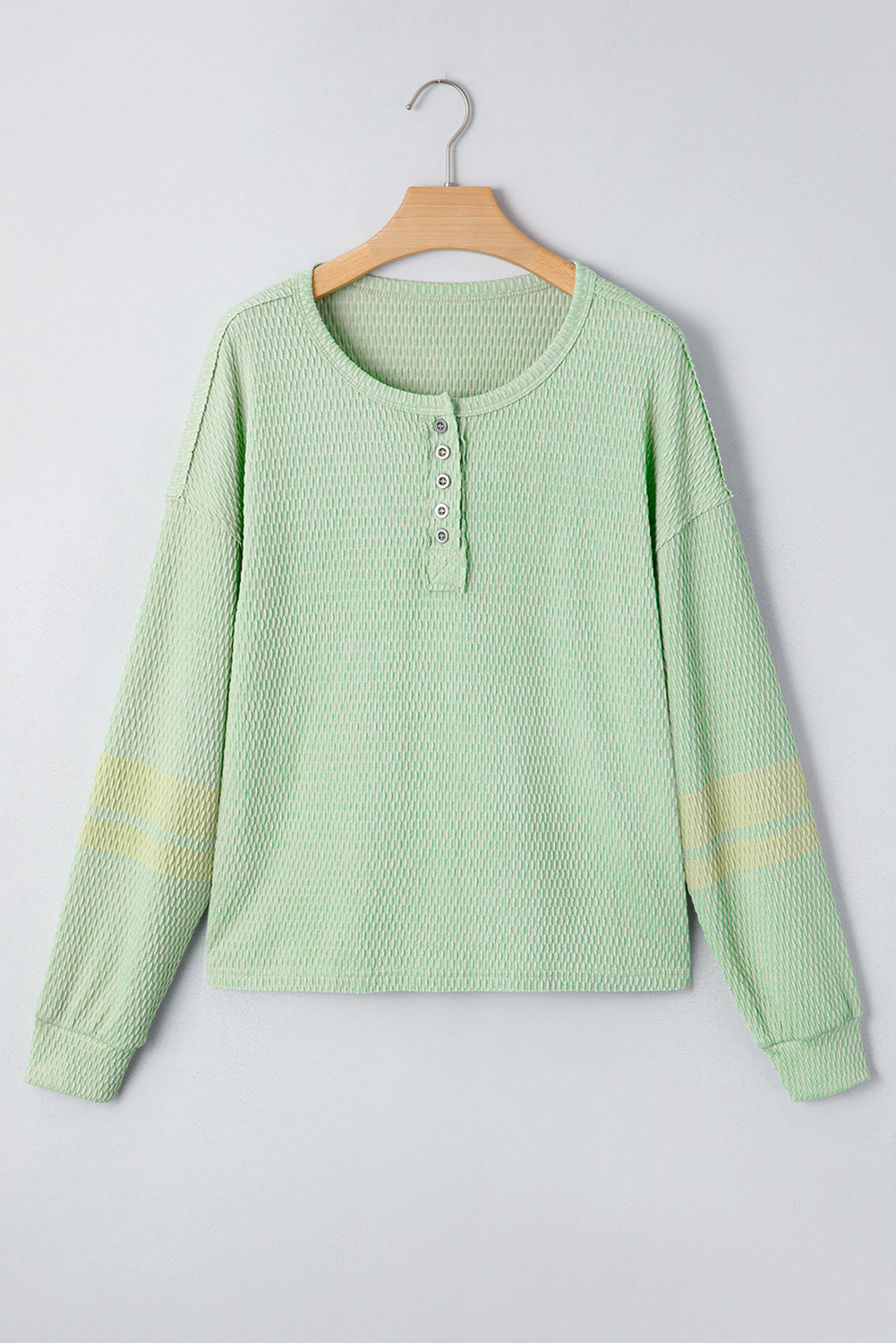 Sudadera Henley con mangas texturizadas y bloques de color verde niebla pradera
