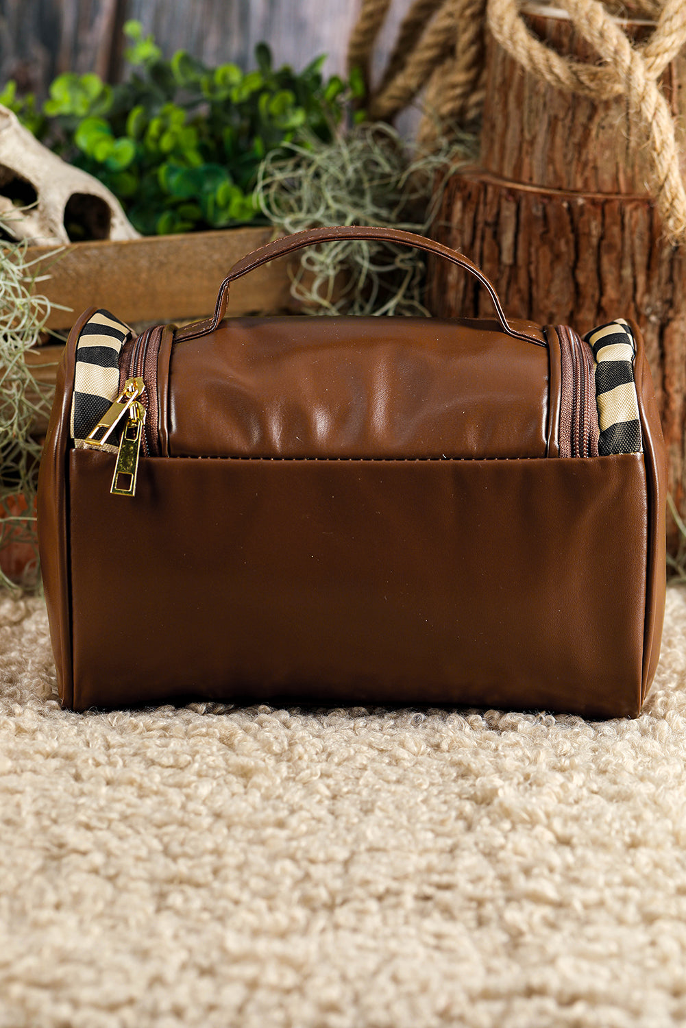 Trousse de maquillage zippée en cuir à imprimé damier noir