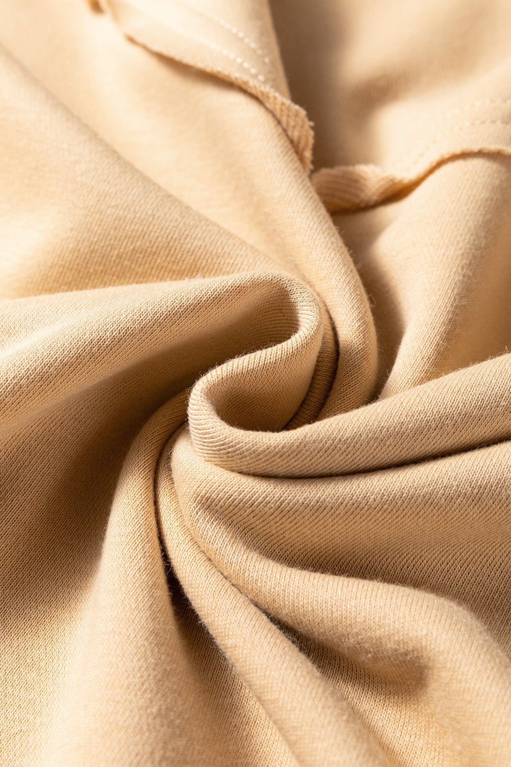 Haut kaki grande taille à imprimé floral et coutures apparentes