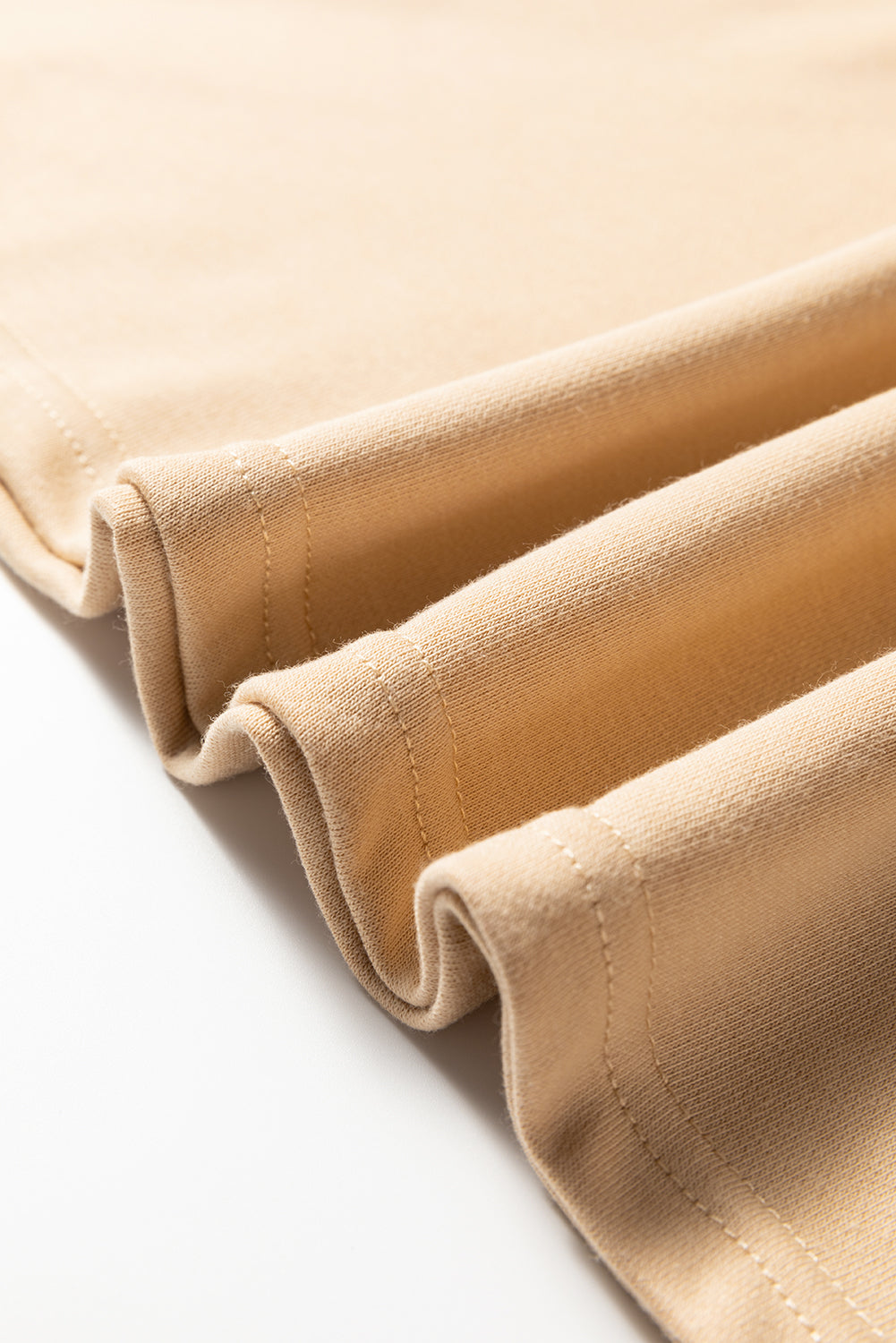 Haut kaki grande taille à imprimé floral et coutures apparentes