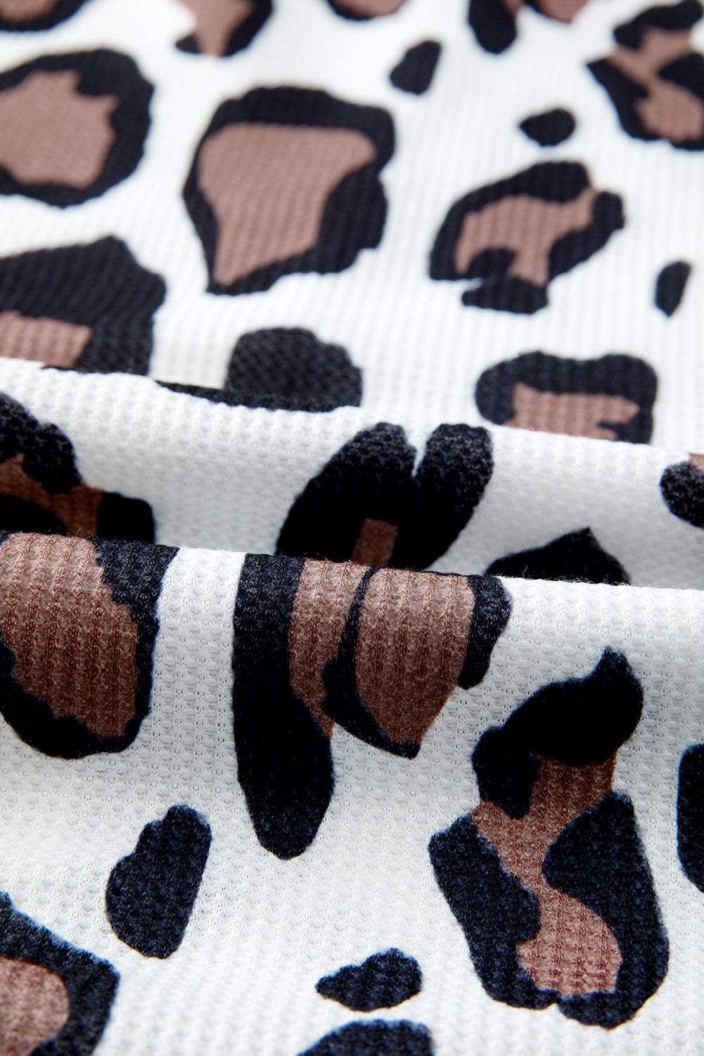 Sudadera con capucha y hombros caídos con cremallera y patchwork de textura mixta de leopardo albaricoque