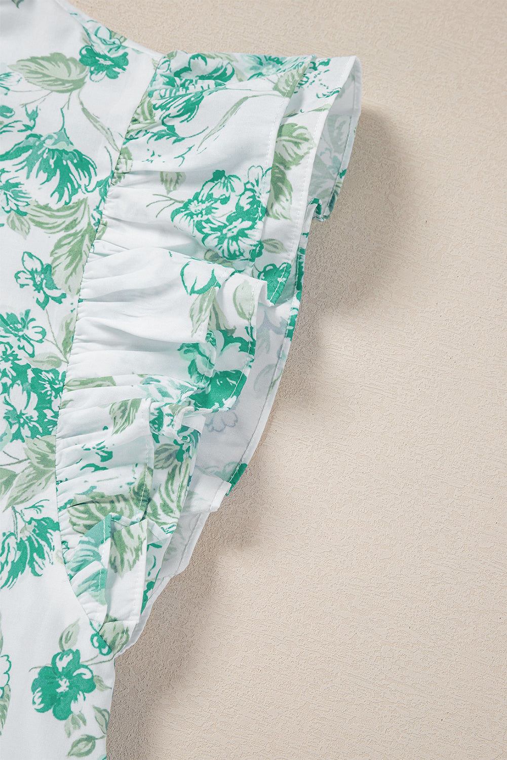 Chemise à volants et imprimé floral bleu ciel