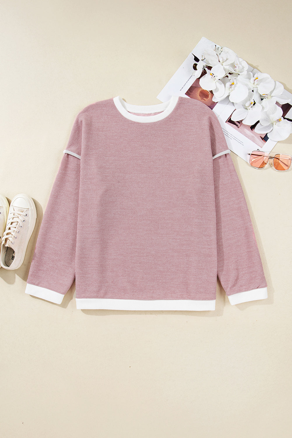 Top de punto con hombros caídos y ribete en contraste rosa claro, talla grande