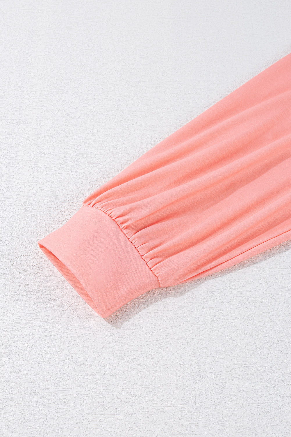 Top de cuello redondo con mangas caídas y bloques de color verde claro