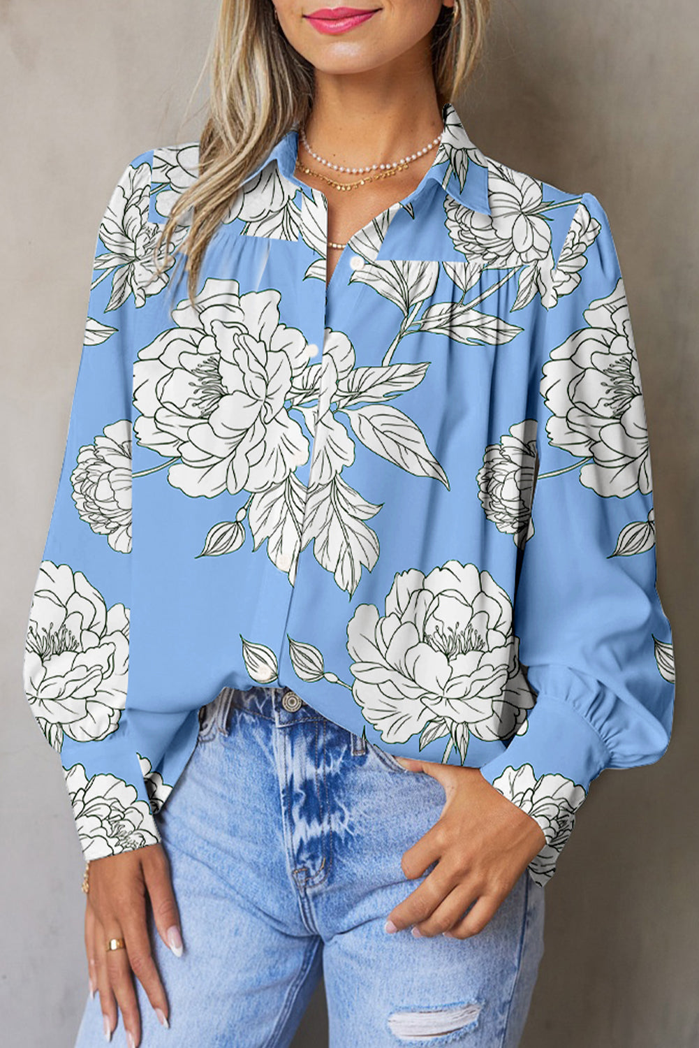 Chemise plissée à manches bouffantes et imprimé floral bleu ciel