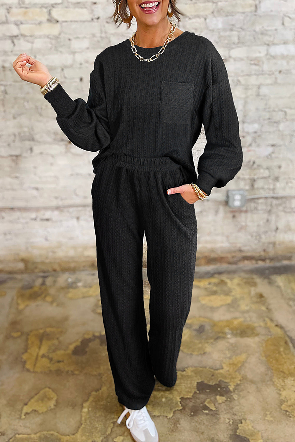 Conjunto de pantalón y top de manga larga con bolsillo en el pecho texturizado en color negro