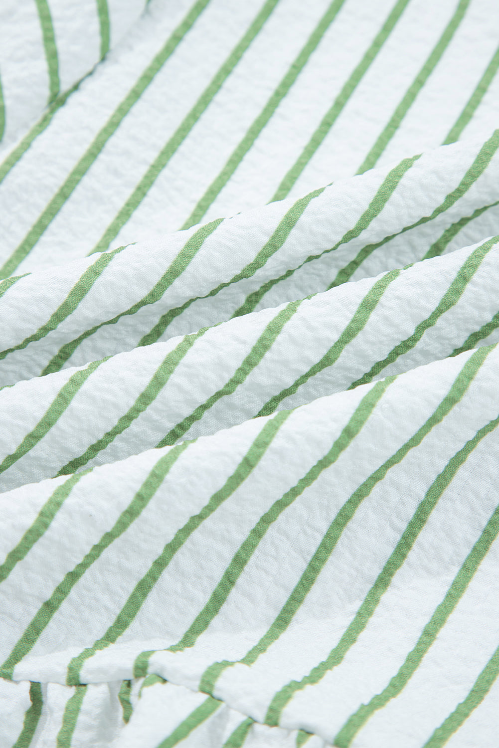 Chemisier babydoll à rayures vertes et manches bouffantes et col cranté