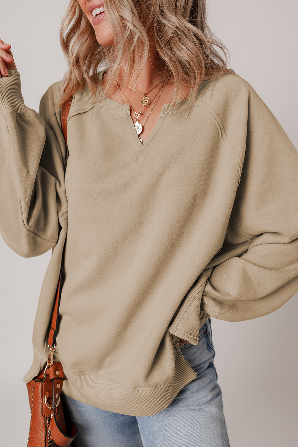 Parchment Raw Edge Exposed Seam Raglan Sleeve Side Slit Sweatshirt