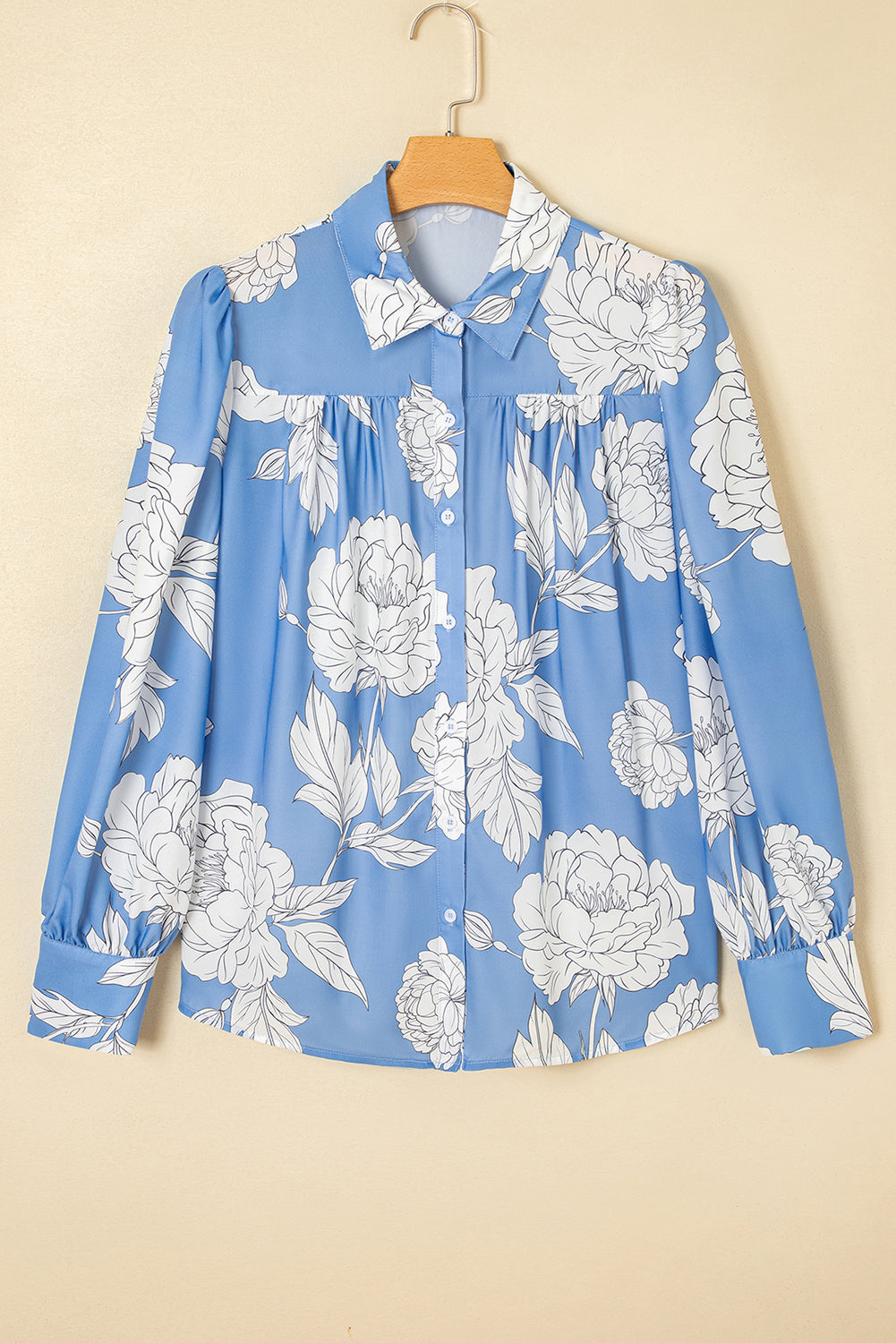Chemise plissée à manches bouffantes et imprimé floral bleu ciel