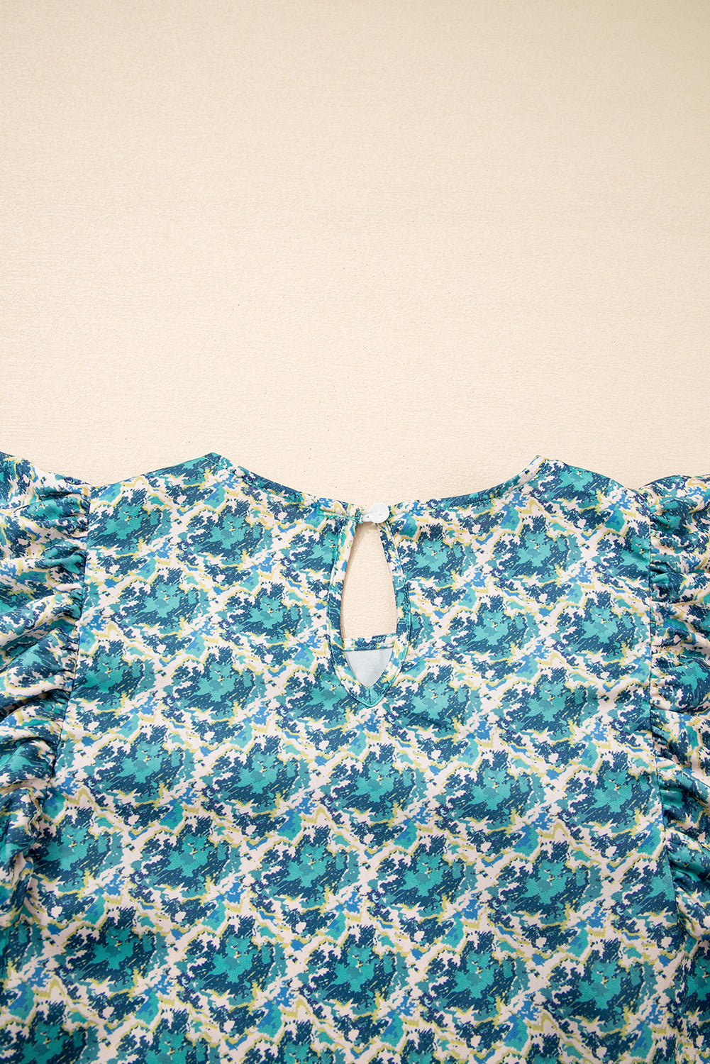 Blusa con mangas abullonadas y puños fruncidos con estampado abstracto verde