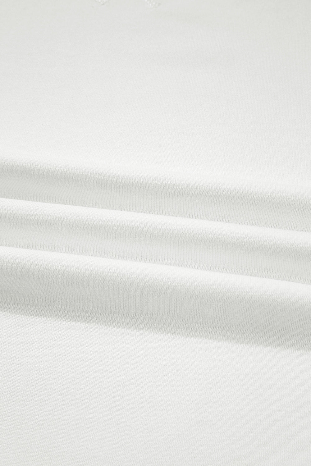 Blusa holgada con mangas globo y volantes de flores blancas de patchwork