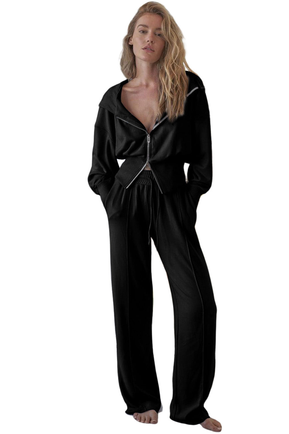 Conjunto deportivo de chaqueta negra con capucha y pantalón deportivo con doble cremallera