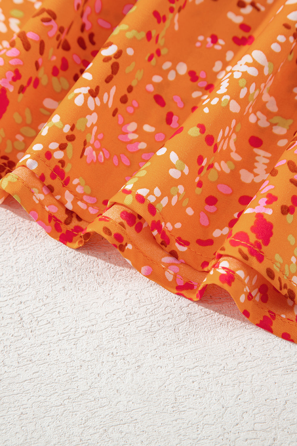 Blouse babydoll à imprimé abstrait Bonbon, coupe ample, col en V et style babydoll