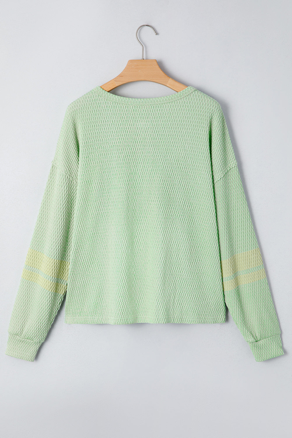 Sudadera Henley con mangas texturizadas y bloques de color verde niebla pradera