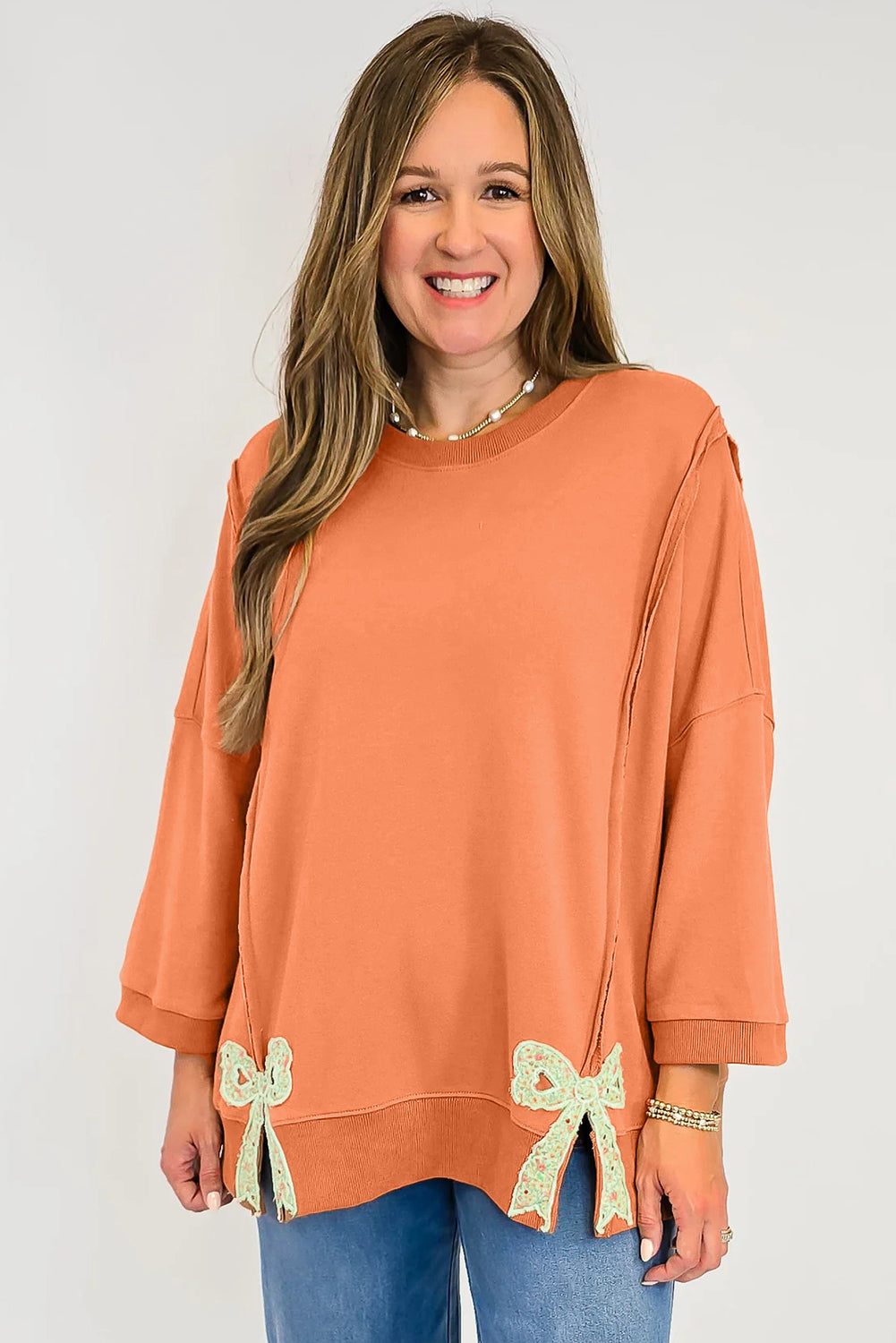 Sweat-shirt ample à motif floral pamplemousse orange et nœud papillon, coutures apparentes, patchwork et fente