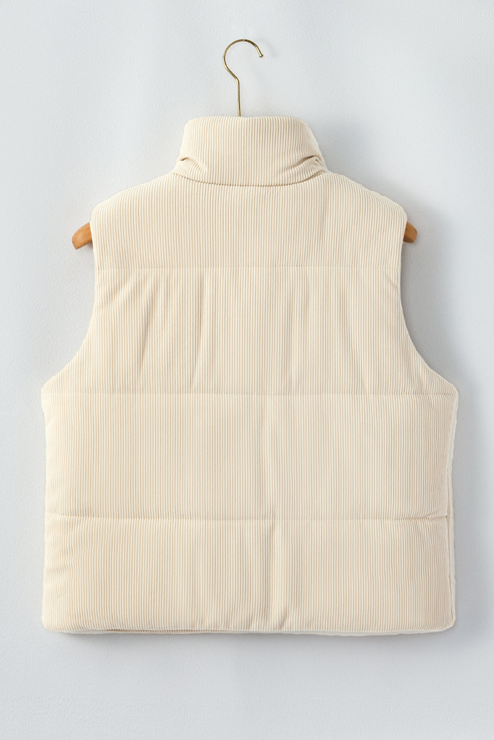 Gilet matelassé zippé en velours côtelé beige à col montant