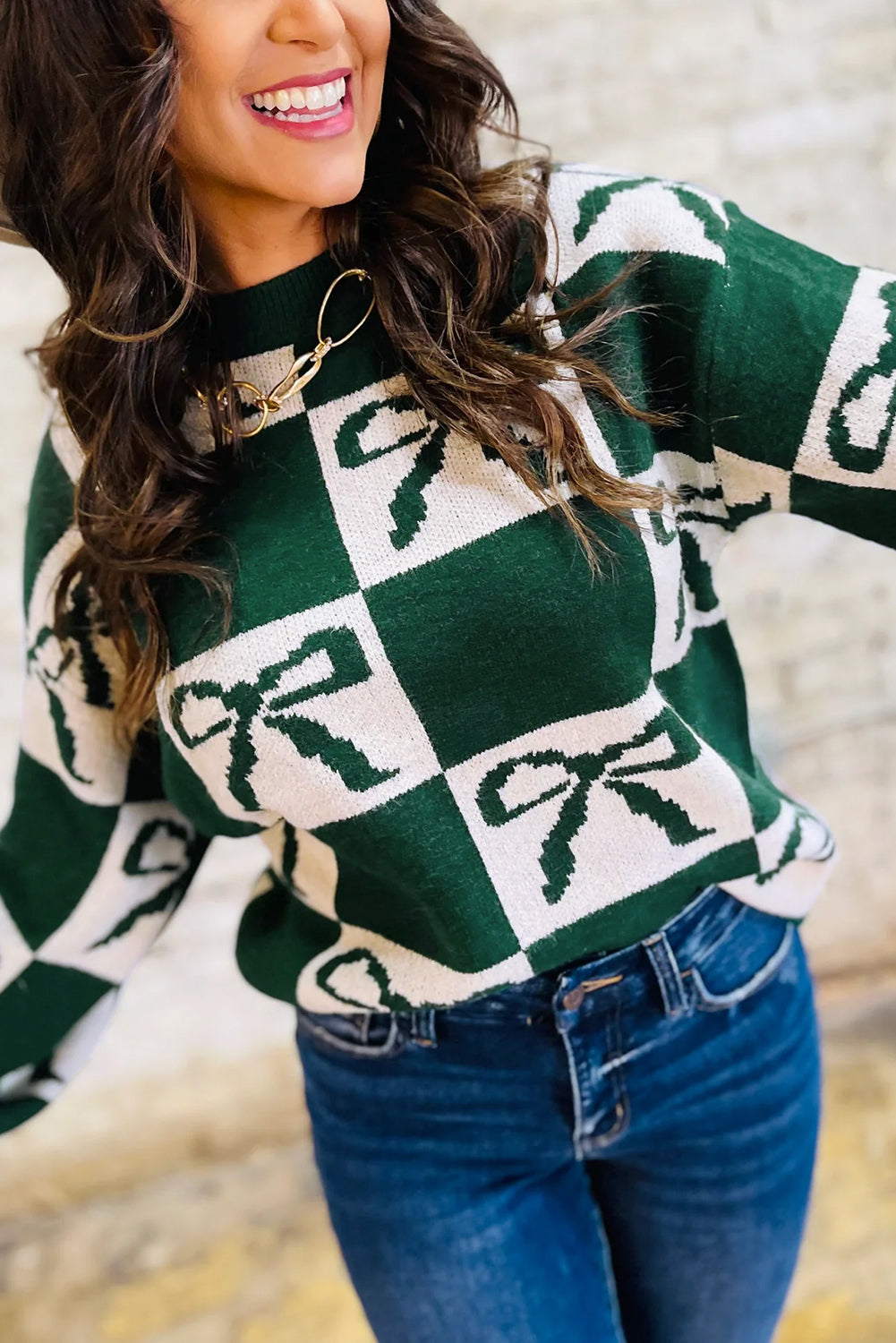 Pull en maille à carreaux vert foncé avec nœud papillon