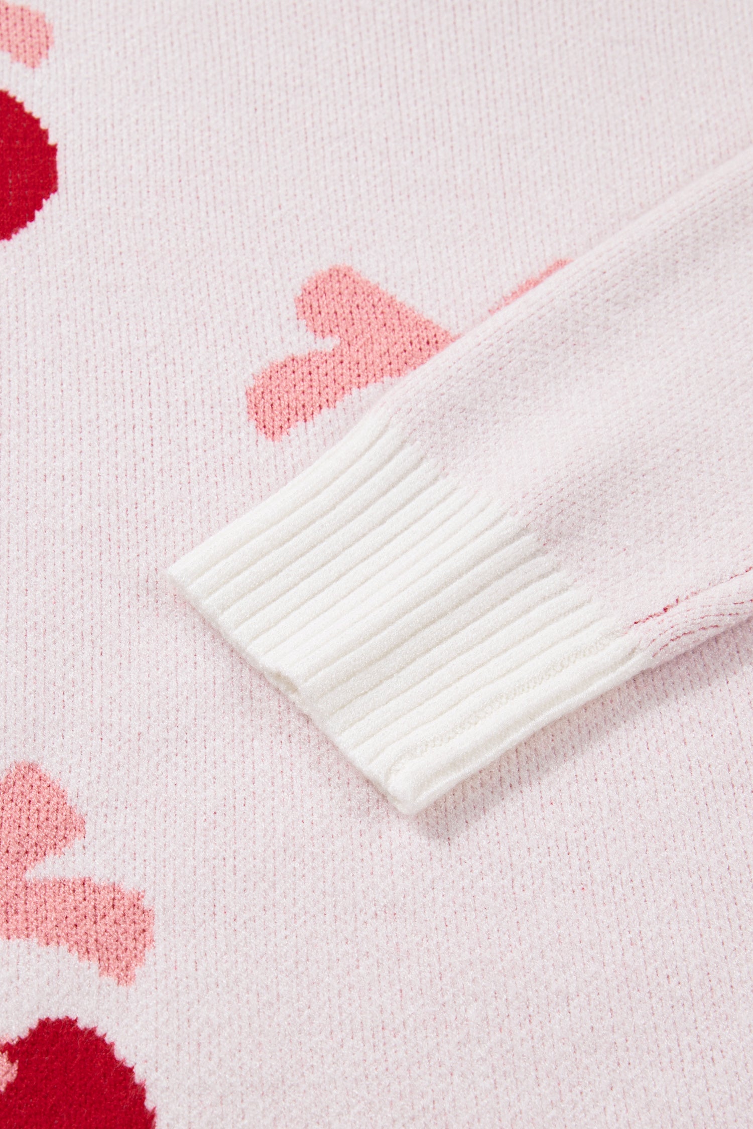 Pull à épaules tombantes à motif cerises blanches