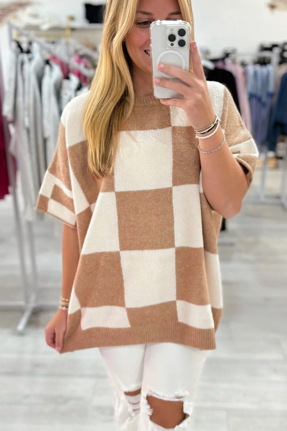 Suéter holgado de manga corta con estampado de cuadros negros