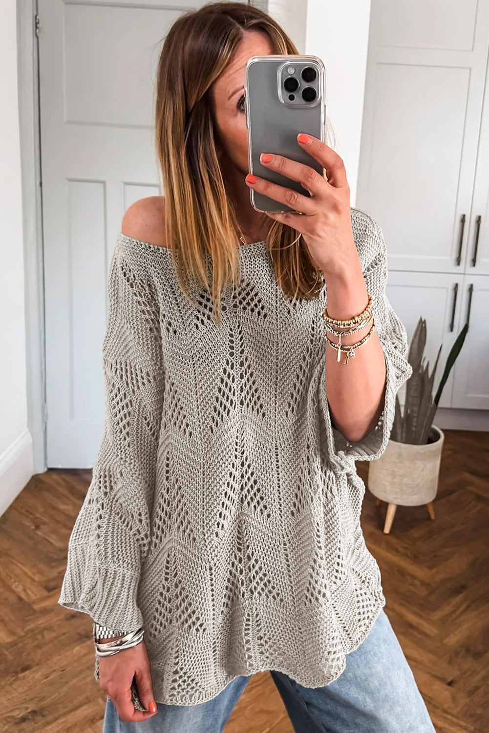 Suéter holgado de punto calado con mangas 3/4 y algas marinas