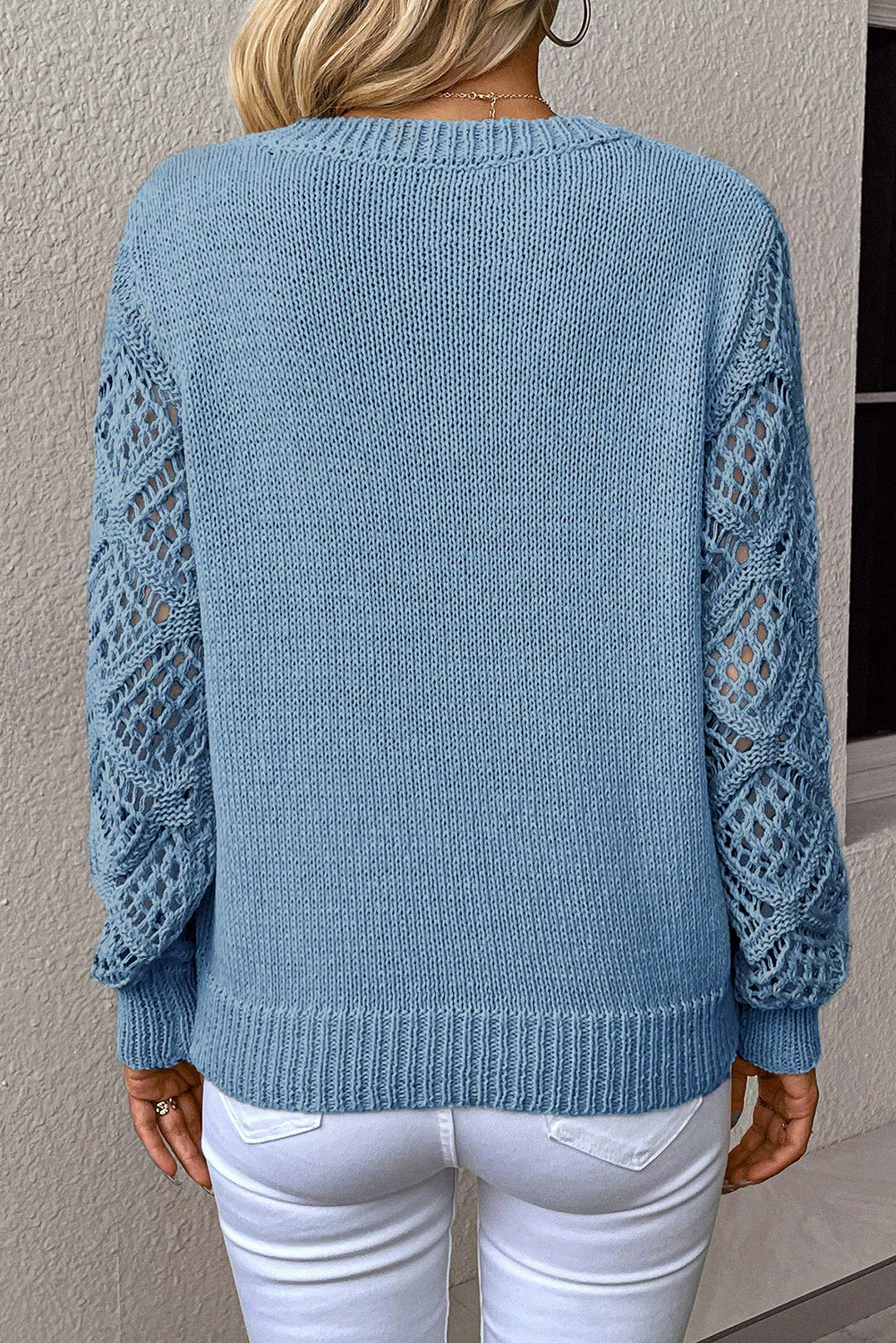 Pull Beau Blue uni à col en V et manches patchwork en maille ajourée