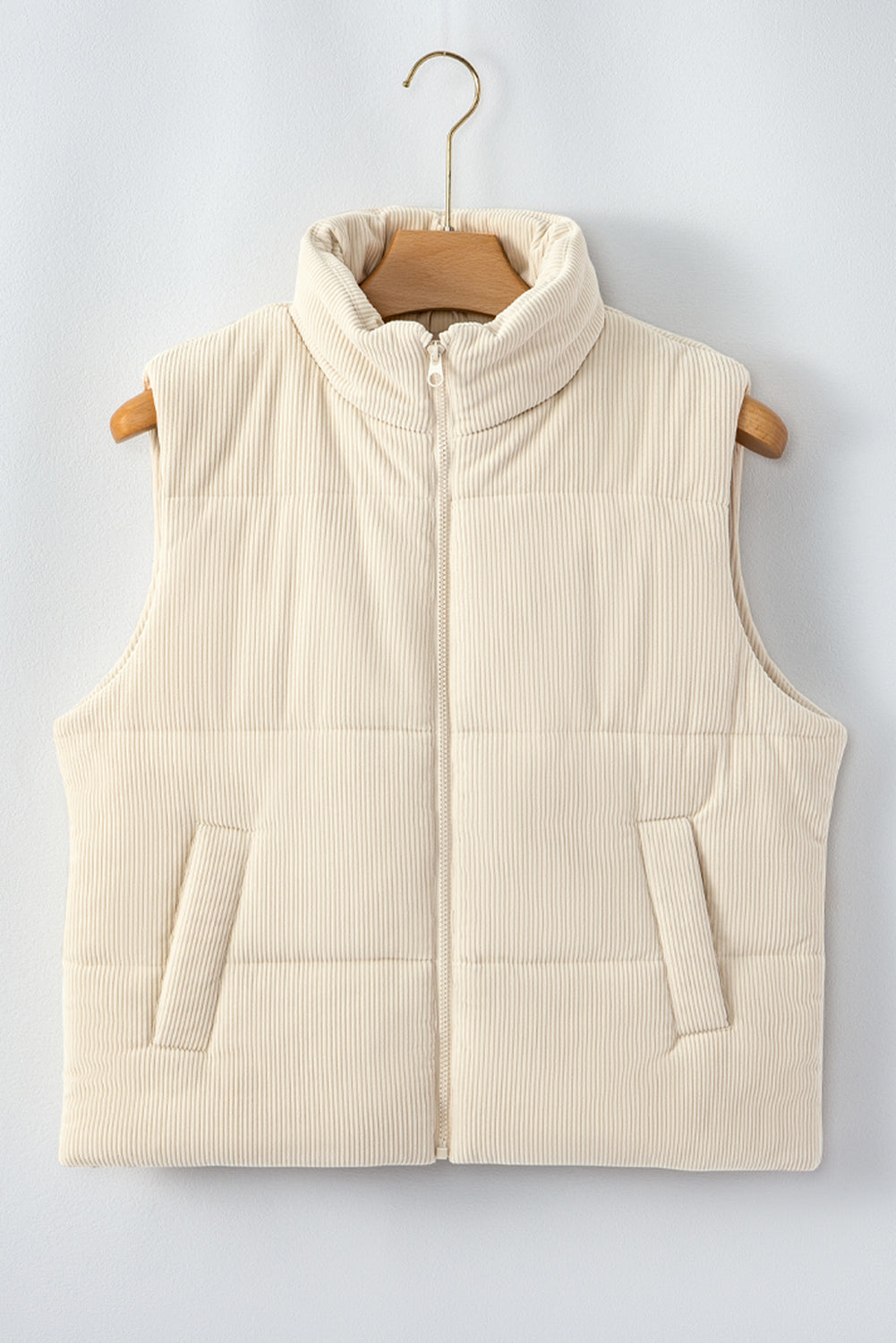 Gilet matelassé zippé en velours côtelé beige à col montant