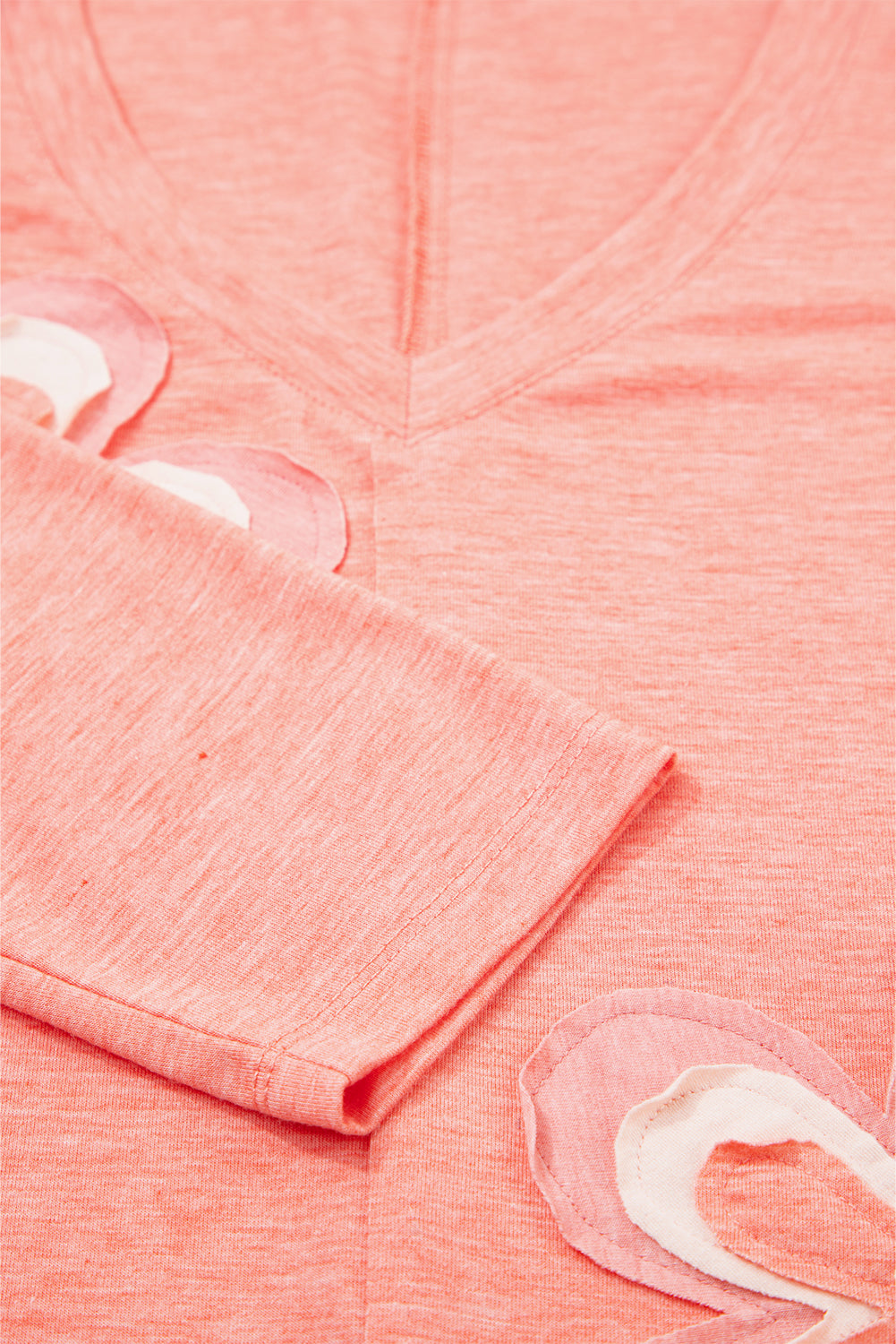 Haut à manches longues et col en V à imprimé floral saumon frais