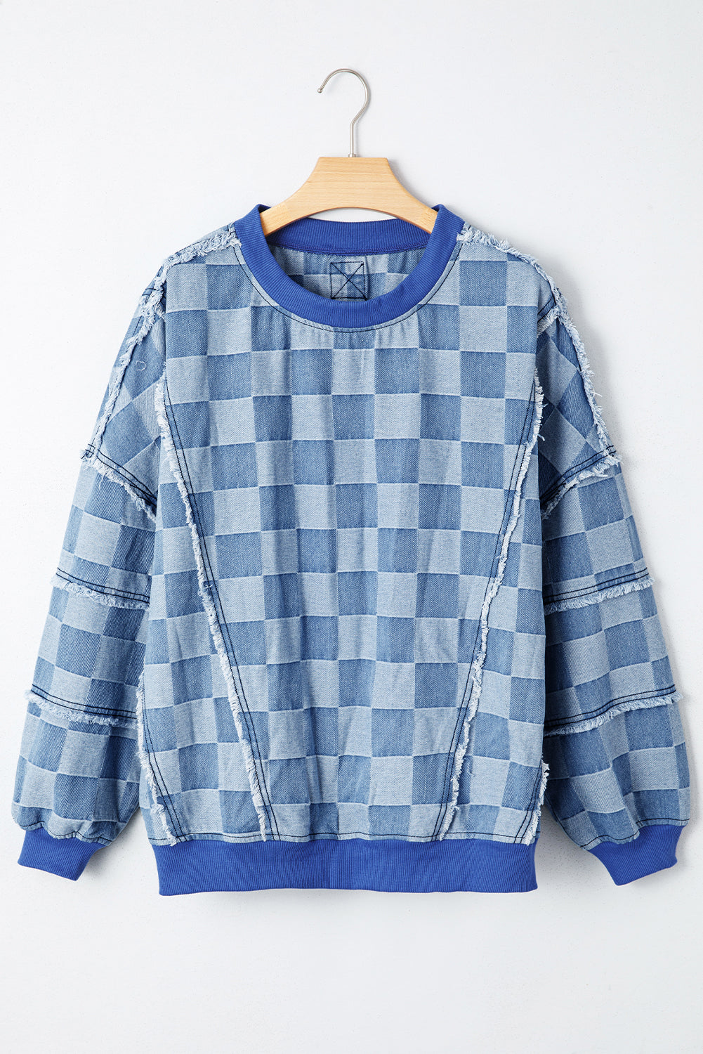 Pull oversize en denim bleu ciel à détails bruts et à motif damier