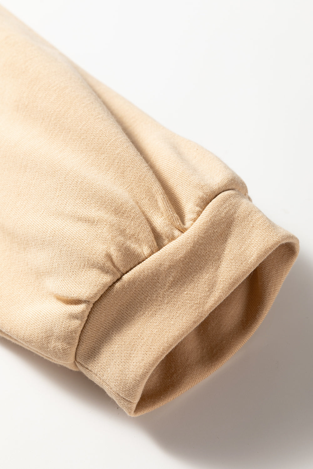 Haut kaki grande taille à imprimé floral et coutures apparentes